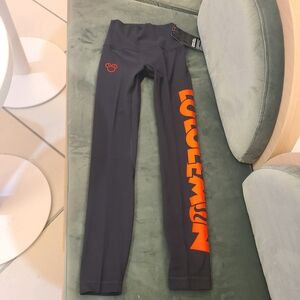 lululemon athletica Kids Black Leggings with Bold Orange Logo
